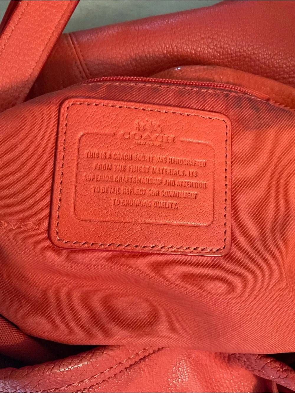 Coach Coral-Red Pebbled Leather Drawstring Hobo
